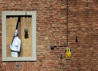 Marble woman at the window.